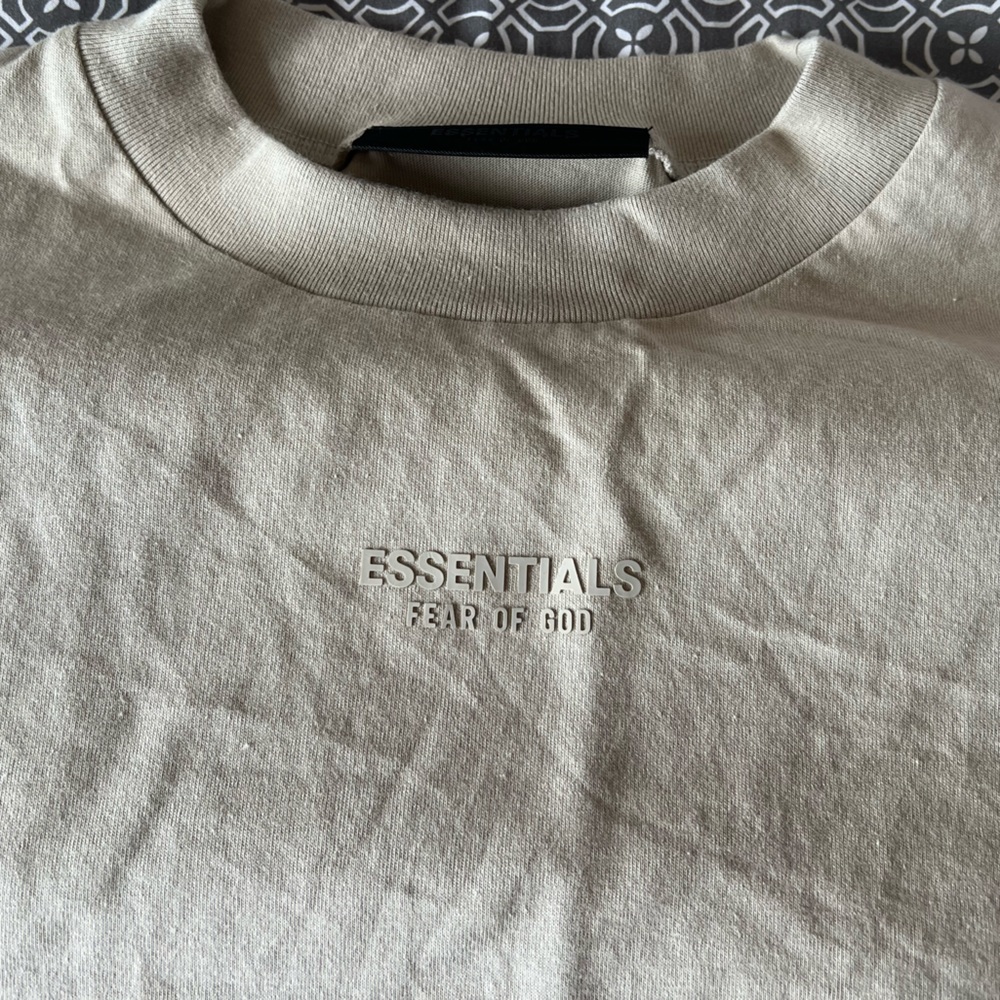 Never worn before tags still on ESSENTIALS shirt